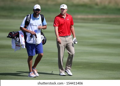 Sep 15, 2013; Lake Forest, IL, USA; Jordan Spieth (r) And Caddie Michael Greller Walk The Eighth Fairway During The Third Round Of The BMW Championship At Conway Farms Golf Club.