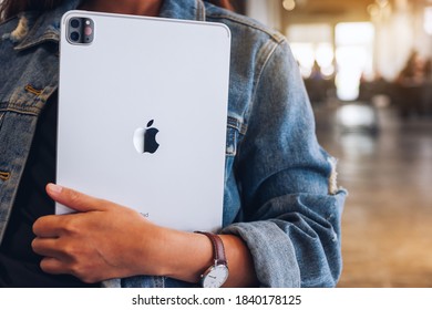 Sep 16th 2020 : A Woman Holding Apple New Ipad Pro 2020 Digital Tablet In Cafe , Chiang Mai Thailand