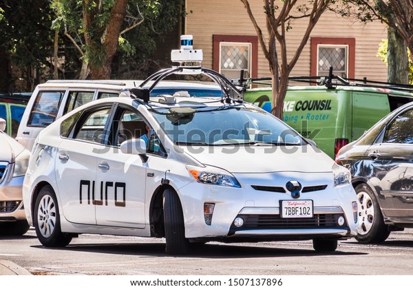 Sep 17, 2019 Mountain View / CA / USA - Nuro\
autonomous vehicle driving on a street in Silicon Valley; Nuro is a\
robotics company founded by two ex Waymo (Google self driving car\
project) engineers