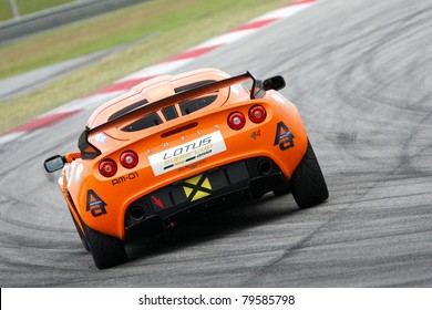 SEPANG - JUNE 17: Chew Ruoh Peng In A Lotus Exige S AM-01takes To The Tracks Of The Sepang International Circuit At The GT Asia Series Race On June 17, 2011 In Sepang, Malaysia.