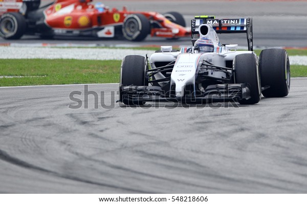 SEPANG, MALAYSIA, 30 March 2014: Valtteri Bottas\
of Williams Martini Racing F1 team during the free practice session\
of 2014 FORMULA 1, Petronas Malaysia Grand Prix at Sepang\
International Circuit.