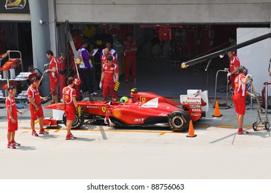 SEPANG, MALAYSIA - APRIL 8: Felipe Massa (team Scuderia Ferrari Marlboro) on the pit at first practice on Formula 1 GP, April 8 2011, Sepang, Malaysia