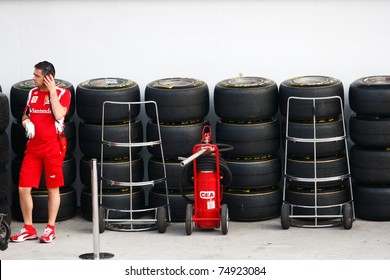 SEPANG, MALAYSIA - APRIL 8: Scuderia Ferrari F1 Pit Crew Prepares The Tires For The Practice And Qualifying Runs Of The Petronas Malaysian F1 Grand Prix On April 8, 2011 Sepang, Malaysia.