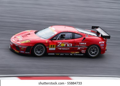 SEPANG, MALAYSIA - JUNE 21: The Jimgainer Dixcel Dunlop F430 Ferrari car (11) in action at the Super GT International Series Round 4 race. June 21, 2010 in Sepang Malaysia.