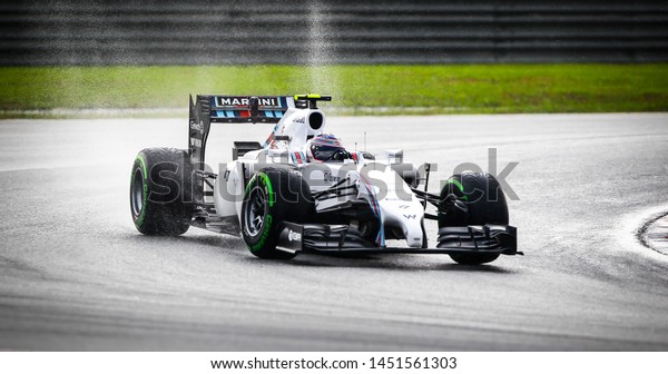 SEPANG, MALAYSIA : Valtteri\
Bottas of Williams Martini Racing F1 team during the F1 Petronas\
Malaysia Grand Prix at Sepang International Circuit on March 30,\
2014