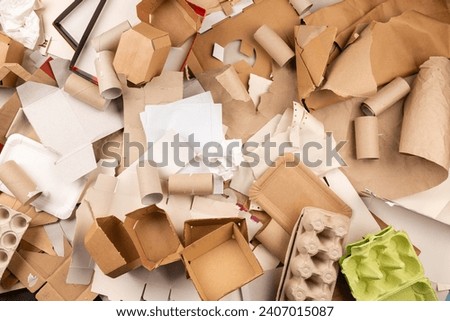 Separate collection of paper garbage. Paper stuff for recycle. Eco friendly concept. Recyclable paper waste background. Zero waste. Recycled product, Craft cardboard and paper. Top view