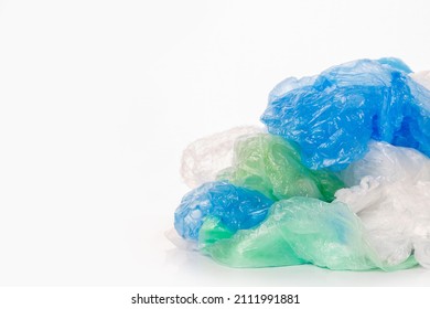 Separate collection of plastic garbage. LDPE stuff for recycle on white background. Eco friendly concept. Recyclable plastic waste: bubble wrap, disposable bags, packing tape. Low Density Polyethylene