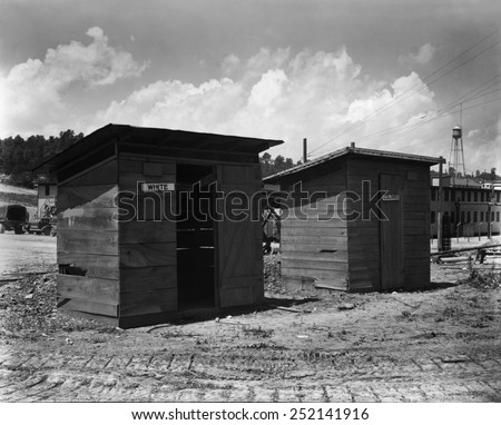 Separate But Equal privies for the construction workers at Clinton Engineer Works, 1943. Construction workers were building the X-10 facility in Oak Ridge, TN.