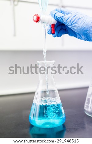 Separating Liquid from a Erlenmeyer to a Funnel in Organic Chemistry Lab