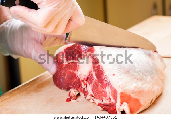 Separation of a raw mutton meat with rib for
meat portions