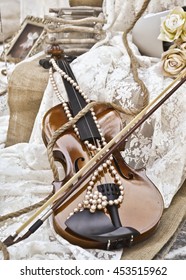 Sepia Photography Of Vintage Violin With Lace Pearls And Roses - Vintage Wedding Decoration