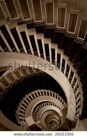 sepia picture of spiral stairway
