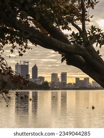 Sepia toned image of the Perth CDB across the Swan River from Matilda Bay 