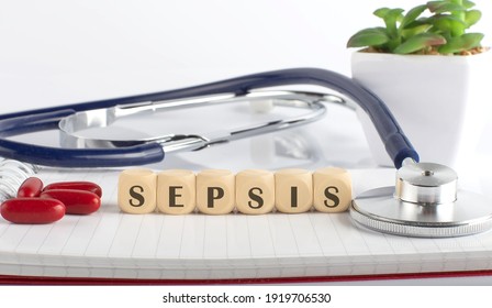 SEPSIS word with building blocks, medical concept background.