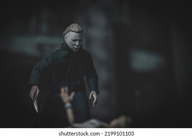 SEPT 5 2022: Halloween Film Franchise Slasher Michael Myers Looming Over A Victim With A Knife - Neca Action Figure 