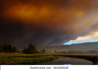 Sept 9, 2020  Walterville Oregon - A Large Glowing Cloud From Wildfires Turn The Sky Red. Black Skies Are Stagnant Through The Willamette Valley From The McKenzie River Fires.