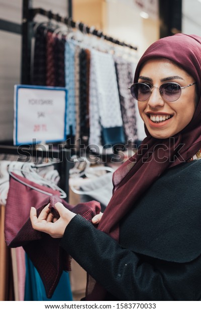 İstanbul, Eminönü - Sept,09 2019: Closed head\
woman doing shopping