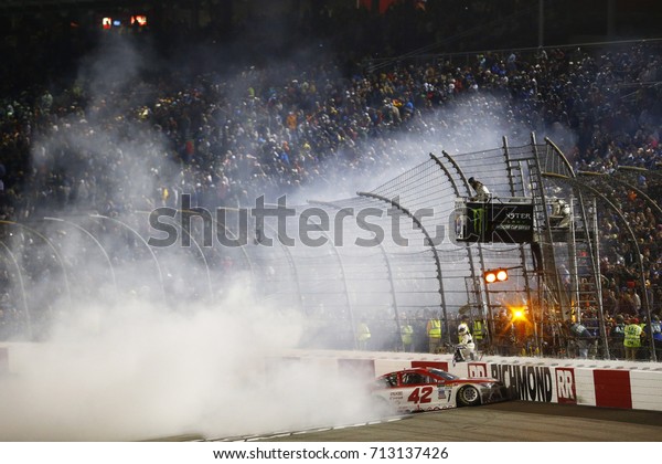 September 09, 2017 -\
Richmond, Virginia, USA: Kyle Larson (42) takes the checkered flag\
and wins the Federated Auto Parts 400 at Richmond Raceway in\
Richmond, Virginia.