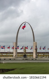 SEPTEMBER 1, 2020 PLAZA DE LA BANDERA. Santo Dominica Dominican Republic. Dramatic Image Of A National  Monument, With Big Arch And Dominican Flag On A Cloudy Day. 