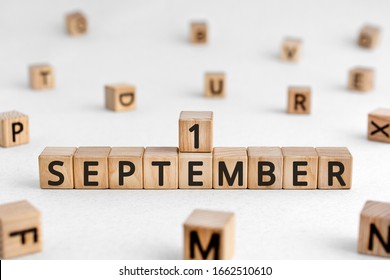 September 1- from wooden blocks with letters, Back to school important date concept, white background random letters around - Shutterstock ID 1662510610