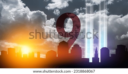 September 11 Tribute In Light Art Installation in the Lower Manhattan New York City Skyline on background of black and white sky. 9.11 date concept. American Patriot Day banner.