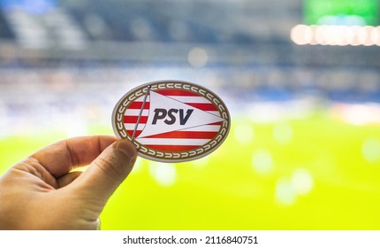 September 12, 2021, Eindhoven, Netherlands. The emblem of the PSV Eindhoven football club against the background of a modern stadium.