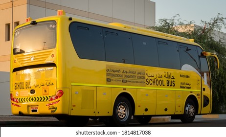 September 14-2020 In UAE. Yellow School Bus In Abu Dhabi, United Arab Emirates, Dubai, Emirates, Gulf, Middle East. Awareness Signs And Symbol Was Written In Arabic Language At School Bus.