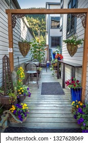 September 15, 2018 - Skagway, AK: Colourful Private Garden Off Broadway Street.