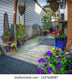 September 15, 2018 - Skagway, AK: Colourful Private Garden Off Broadway Street.