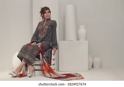 September 15, 2020: Beautiful Pakistani Women In Traditional Embroidery Shalwar Kameez Dress. Fashion Concept