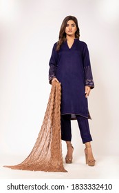 September 15, 2020: Beautiful Pakistani Women In Traditional Embroidery Shalwar Kameez Dress. Fashion Concept