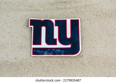 September 15, 2021, Moscow, Russia. The Emblem Of The New York Giants Football Club On The Sand Of The Beach.