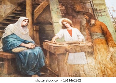 September 18 2019. Nazareth, Israel. Saint Joseph's Church. Holy Family. Virgin Mary, St. Joseph And The Young Jesus In The Carpenter's Workshop