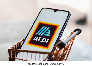 September 18, 2021, Brazil. In this photo illustration the Aldi logo displayed on a smartphone along with a shopping cart