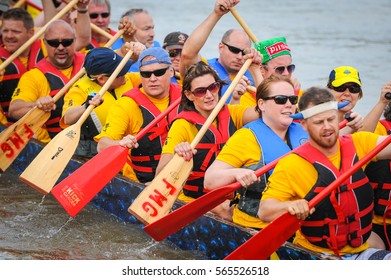 September, 2015  Red River In Winnipeg, MB, Canada Team Building Activity During Rowing Dragon Boat Race