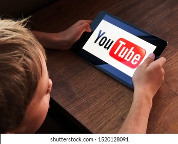 September 2019 Parma, Italy; Boy Watching Youtube Kids On Tablet 