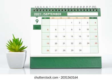 September 2021 Desk Calendar With Pink Small Cactus Plant.