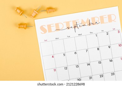 The September 2022 and wooden push pin on yellow background. - Shutterstock ID 2121228698