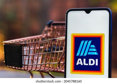 September 22, 2021, Brazil. In this photo illustration the Aldi logo displayed on a smartphone along with a shopping cart