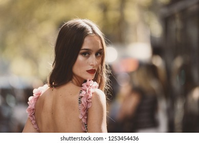 September 23, 2018: Milan, Italy -  Young model posing after a fashion show during Milan Fashion Week  - MFWSS19