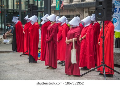 September 27, 2020, Chicago, IL A Group Of Protestors Wearing Red Handmaid\'s Tale Costumes At A Voter Drive Initiative