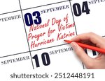 September 3. Hand writing text National Day of Prayer for Victims of Hurricane Katrina on calendar date. Save the date. Holiday.  Important date. Day of the year concept.