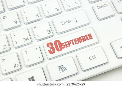 September 30th. Day 30 Of Month, Calendar Date. Cropped View Of Modern White Computer Keyboard With Calendar Date. Concept Workspace, Freelance, Deadline.  Autumn Month, Day Of The Year Concept