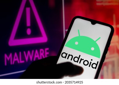 September 4, 2021, Brazil. In This Photo Illustration The Android Logo Displayed On A Smartphone With Malware Alert In The Background