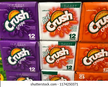 SEPTEMBER 6 2018 - MINNEAPOLIS MN: Three Flavors Of Crush Soda 12 Packs On Display At A Grocery Store. Diet Orange Crush, Crush Grape And Original Orange Crush Pop Cans.