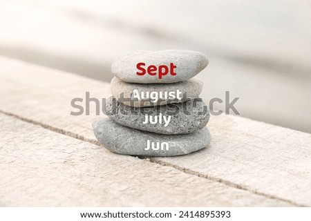 September writing on the stones. Ninth month of the year. Beginning of autumn concept