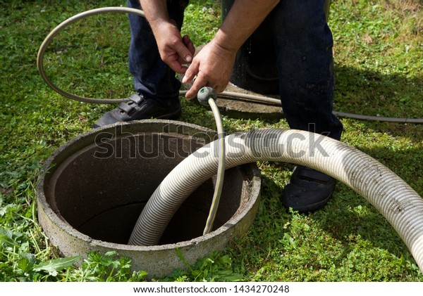 Septic tank: the\
removal of sewage sludge and cleaning of a domestic septic tank at\
rural French home.