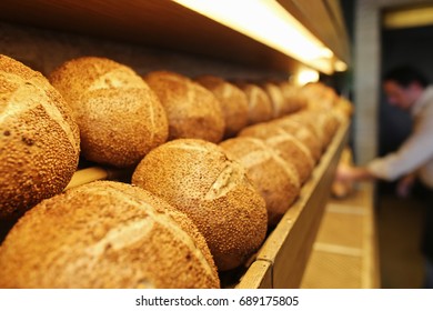 Sequential walnut bread on the shelves, Pastry, Patisserie and Bakery - Powered by Shutterstock