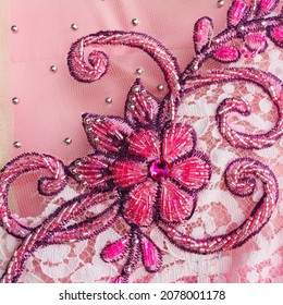 Sequin drawing pattern with beautiful leaf and flower motifs made of pearls on a pink kebaya.
