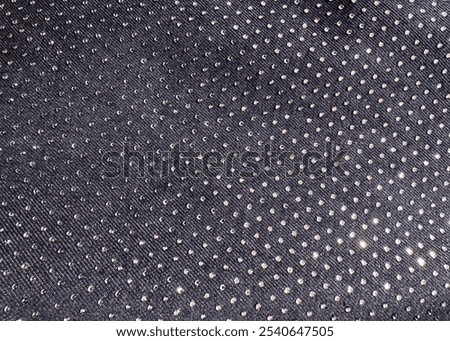 Sequins close-up macro. Abstract background with sequins on the fabric